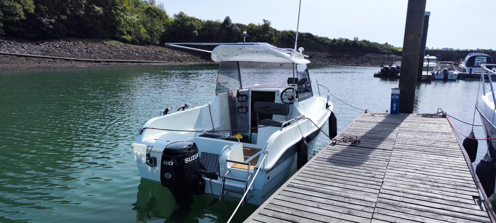 Swordfish 540 Pilothouse Suzuki DF60 + DF6 + EXT1300 Braked Trailer
